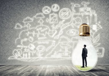 Ampulün içindeki iş adamı