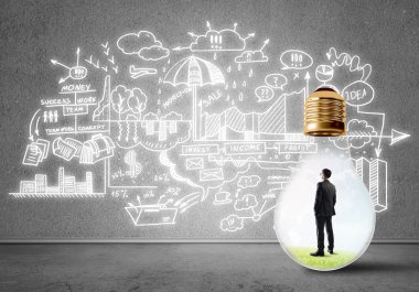 İşadamı ampul içinde 
