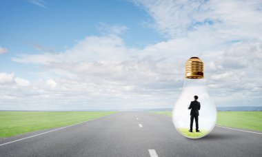 işadamı ampul içinde sıkışmış