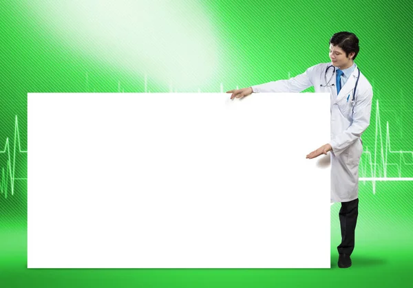 Doctor with white blank banner — Stock Photo, Image