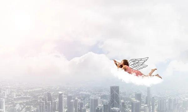 Woman flying in sky — Stock Photo, Image