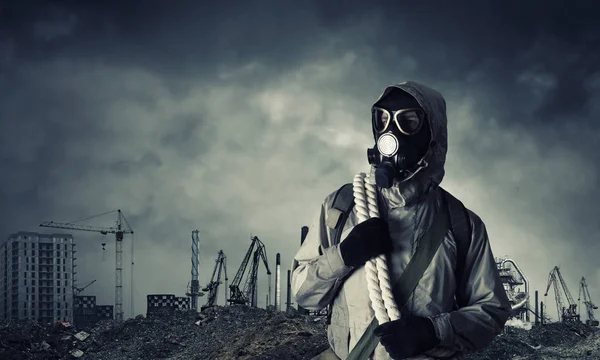 Man survivor in gas mask — Stock Photo, Image