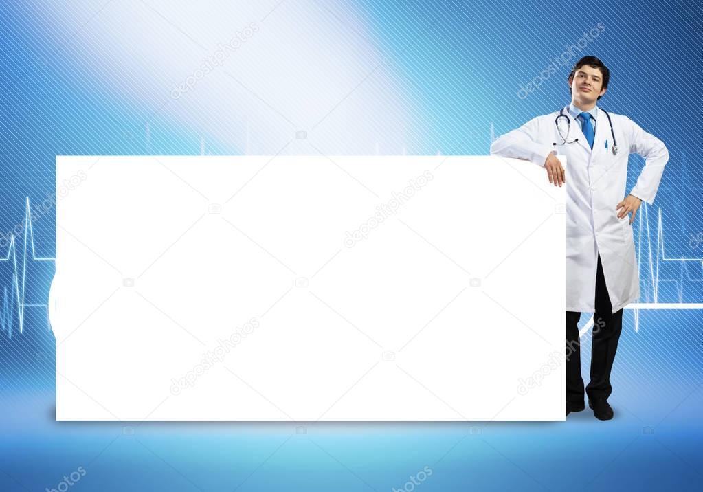 Doctor with white blank banner