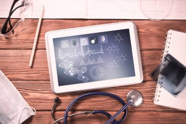 Beyaz tablet pc ve doktor araçları