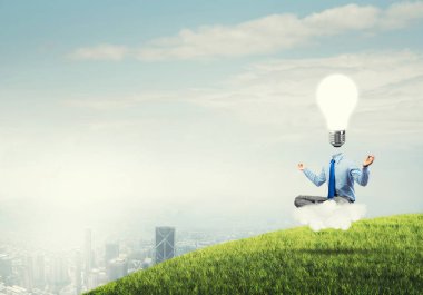 Lotus poz oturan işadamı 