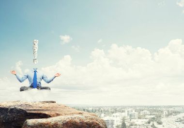 Lotus poz oturan işadamı