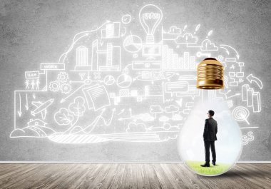 İşadamı ampul içinde 