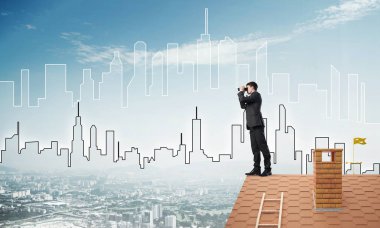 Çatıda duran işadamı