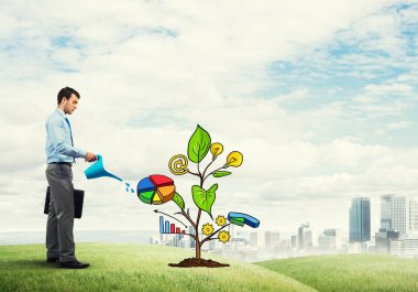 Yakışıklı işadamı sunan yatırım kavramı