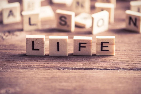 Elementos de madeira com letras — Fotografia de Stock