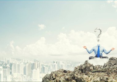 Lotus poz oturan işadamı