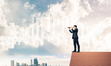 Çatıda duran işadamı