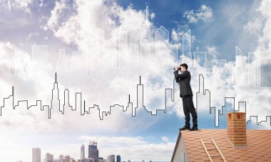 Çatıda duran işadamı 