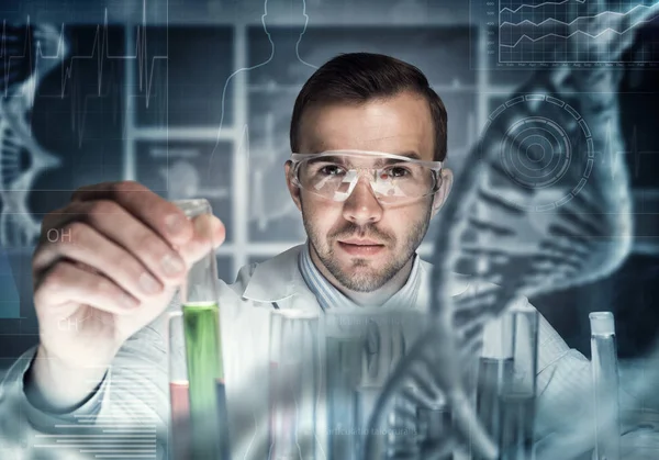 Handsome scientist making — Stock Photo, Image