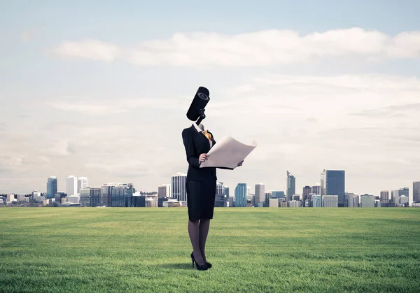 Femme d'affaires avec caméra au lieu de la tête — Photo