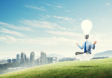 Lotus poz oturan işadamı