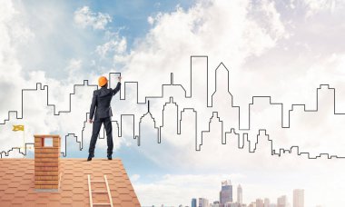 Adam mimar modern şehir silüeti çizmek 