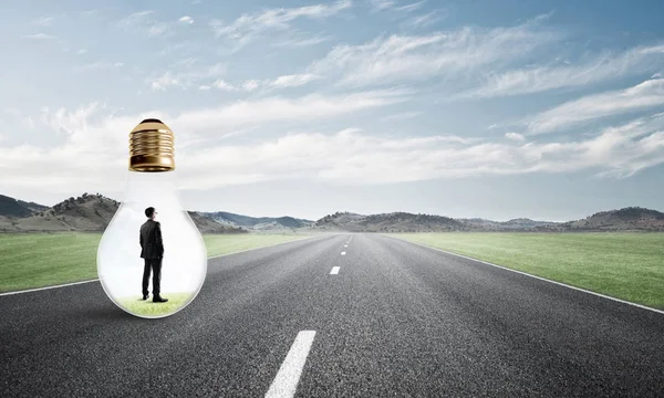 Ampulün içindeki iş adamı