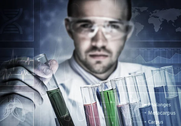 Young scientist mixing reagents — Stock Photo, Image