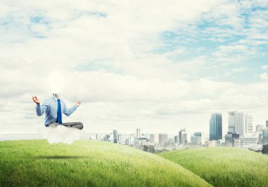 Lotus poz oturan işadamı