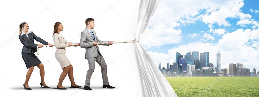 businesspeople pulling white blank fabric