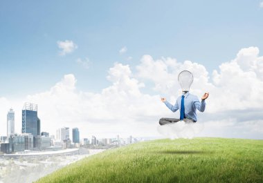 Lotus poz oturan işadamı