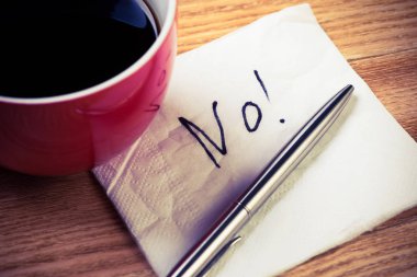 Kahve fincanı kalem ve peçete