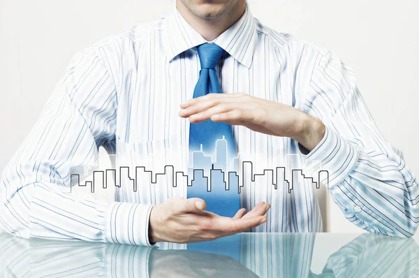 Empresário apresentando conceito imobiliário — Fotografia de Stock