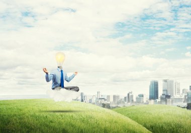 Lotus poz oturan işadamı