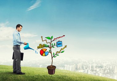 İşadamı sulama çizilmiş büyüme kavramı 