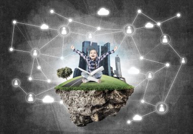 kitap yüzen ada üzerinde oturan kızla 