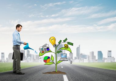 İşadamı sulama çizilmiş büyüme kavramı 