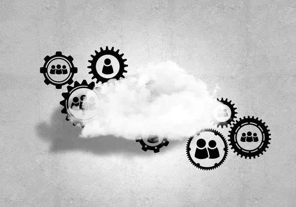 Gears and cloud on concrete wall — Stock Photo, Image