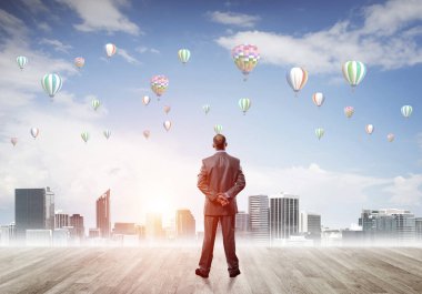 Arka ayakta işadamı 