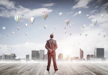 Arka ayakta işadamı 