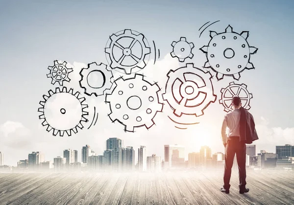 zakenman te kijken naar moderne stad 