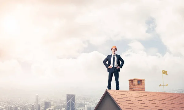 Engineer standing on roof