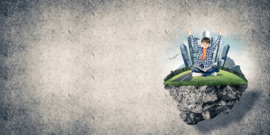 yüzen ada üzerinde oturan çocuk