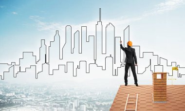 adam evin çatı ve çizim şehir