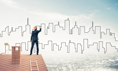 adam evin çatı ve çizim şehir