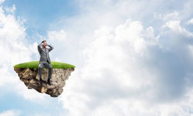 Yeşil Adası'nda oturan işadamı