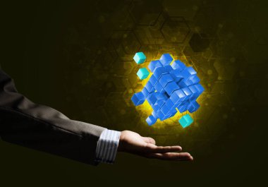 küp şekil tutan el 