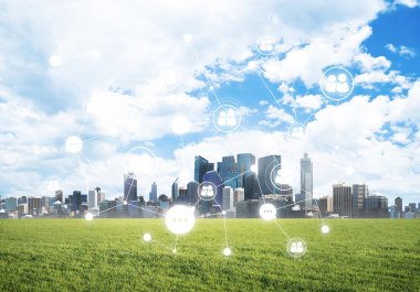 Yeşil çim ve ekranda sosyal bağlantı kavramı ile modern cityscape