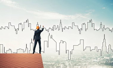 Adam mimar modern şehir silüeti çizmek 