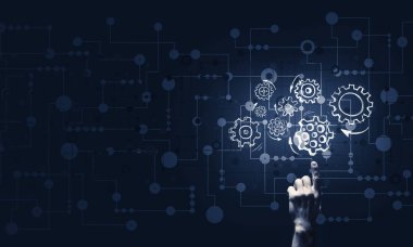 Koyu arka plan üzerinde parlayan dişli mekanizması, parmakla işaret eden işadamı el kapatın 