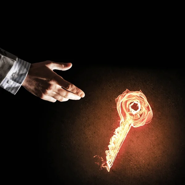 Parlayan anahtar simgesi ateş — Stok fotoğraf