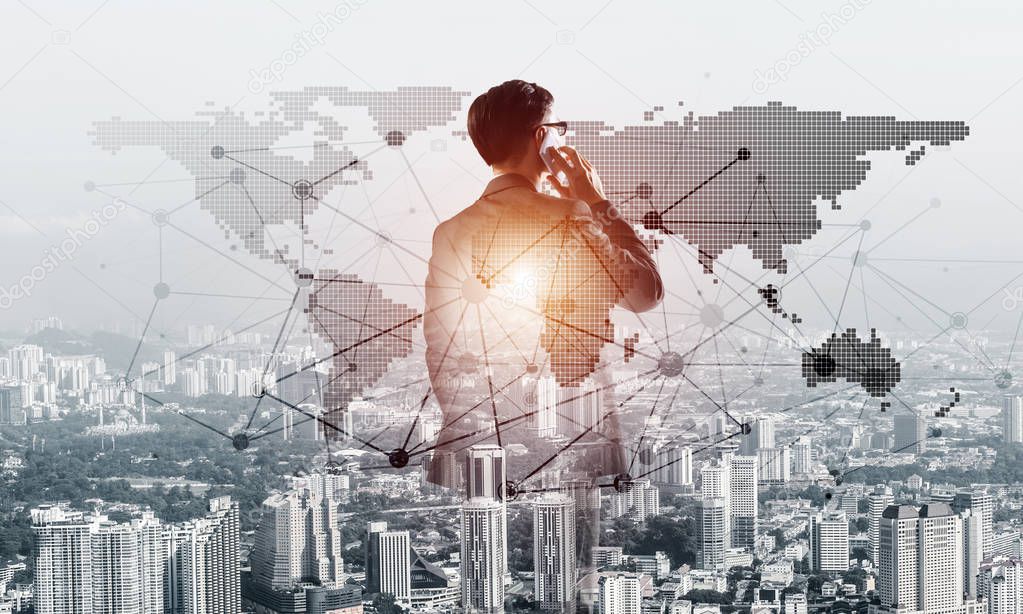 Double exposure of elegant businessman standing with back and talking mobile phone