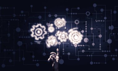 Koyu arka plan üzerinde parlayan dişli mekanizması, parmakla işaret eden işadamı el kapatın 