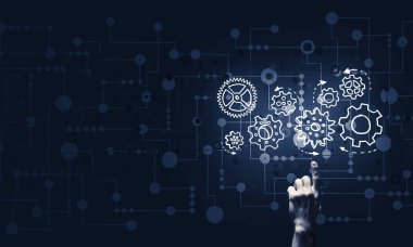 Koyu arka plan üzerinde parlayan dişli mekanizması, parmakla işaret eden işadamı el kapatın 