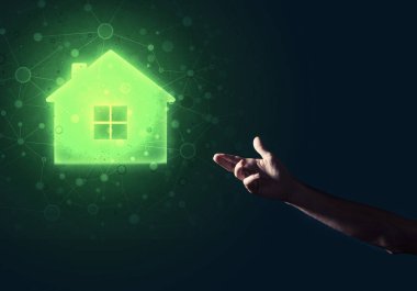 parlayan ev simgesini dokunmadan adam